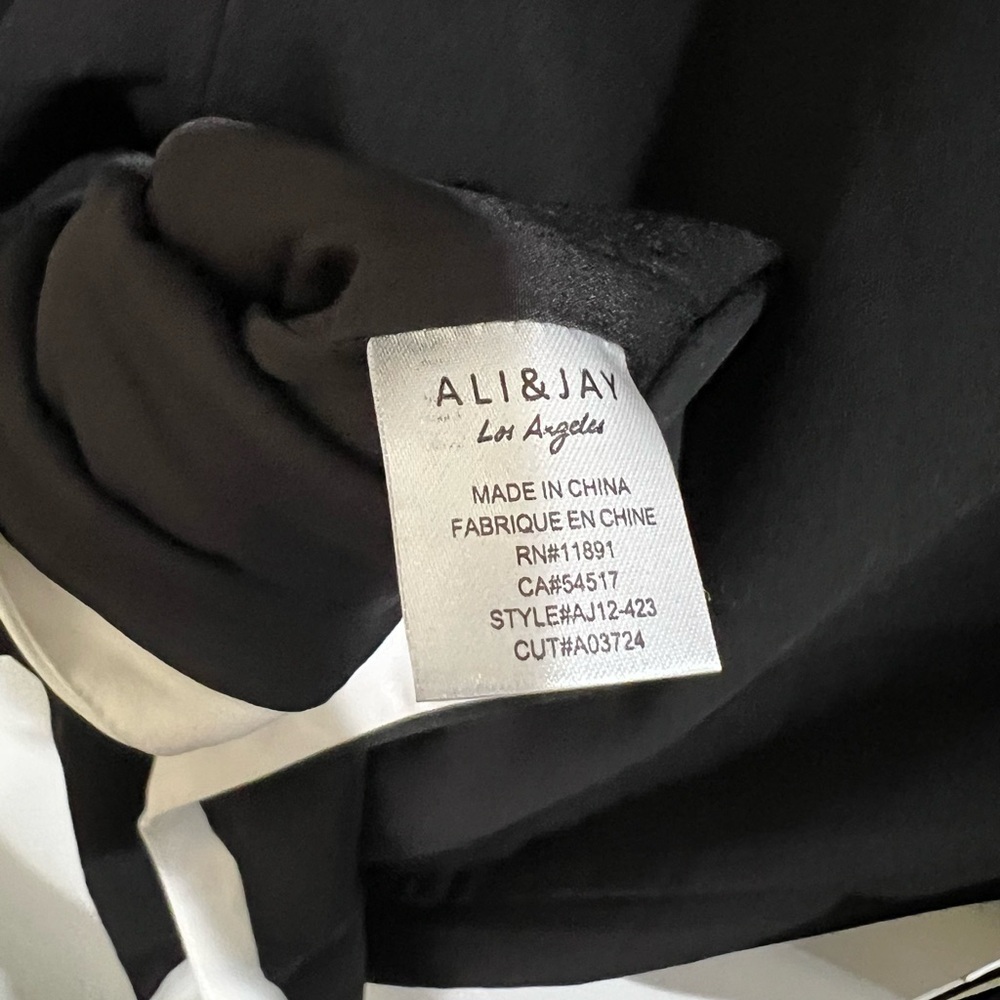ALI & JAY Elegant Black Dress with White Accents - Picture 9 of 10